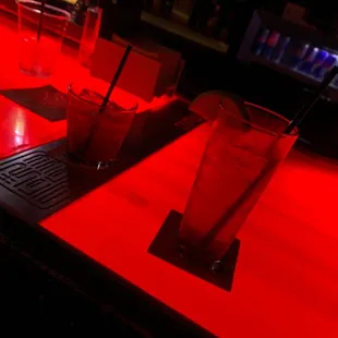 a bar with red lights