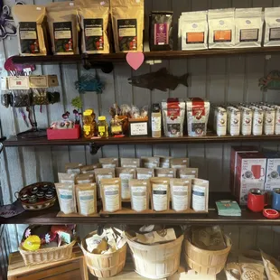 a shelf of coffee and tea products