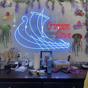 a neon sign on a desk