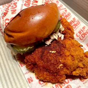 The Crimson Sandwich. Large, fried boneless chicken breast (Medium heat) with coleslaw, pickles, and Crimson sauce.