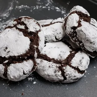 a pile of chocolate crinkle cookies