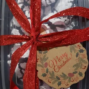 a plastic container filled with cookies