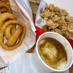 These are all from the side dish menu. Onion rings, mashed potatoes &amp; spicy chicken nuggets.