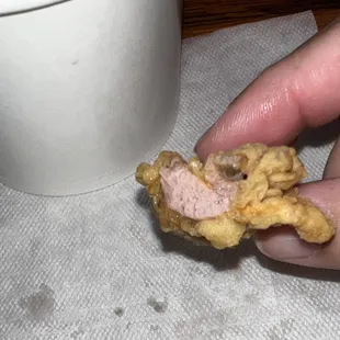Spicy chicken nugget. Looks pink because they marinate the meat in a red fluid. Fear not because everything was fully cooked and DELICIOUS!