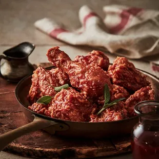  a closeup of a bowl of fried chicken