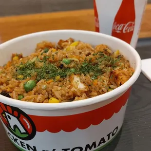 Creepy veggie fried  rice bowl $7 plus $2 chicken,  free soda