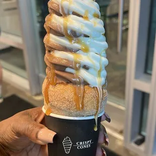 Swirl crispy cone topped with Carmel sauce