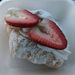 two strawberries on top