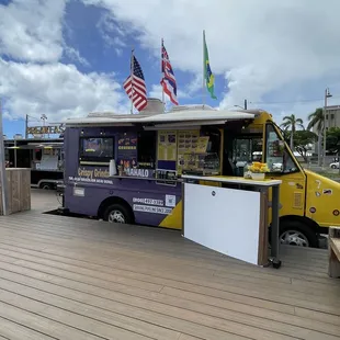 a food truck on a boardwalk