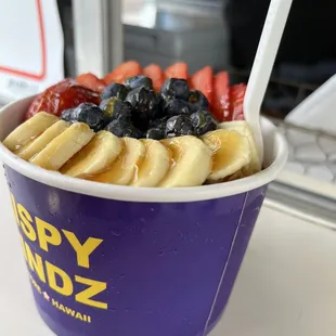 a bowl of fruit and yogurt
