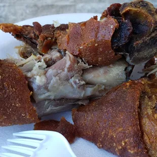 The fried pig knuckle meat just falls off the bone. It's super tender but the skin is so crunchy. No grease either.