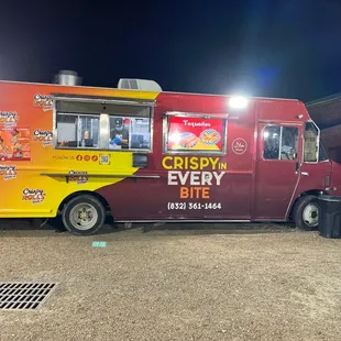 a food truck parked in a parking lot