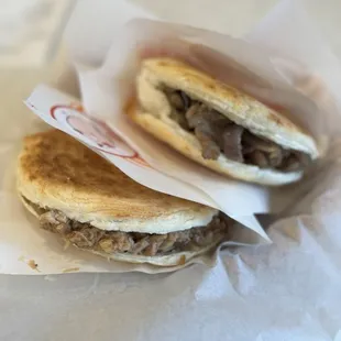 Crispy Lamb Bun (top) and Crispy Pork Bun (bottom)
