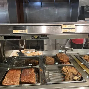 a variety of food items in a display case