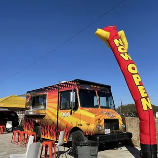 a food truck parked in a parking lot