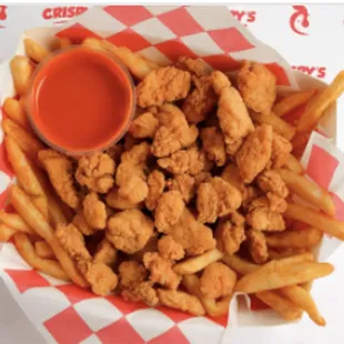 a basket of fried chicken and fries