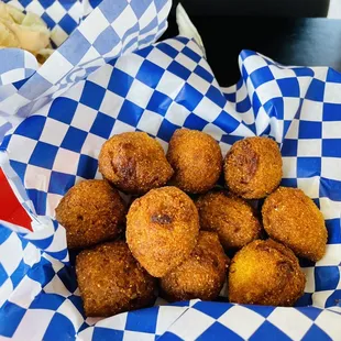 ows a basket of fried fish and chips