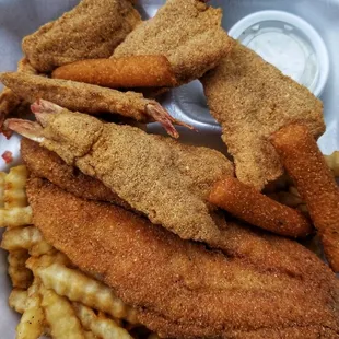 6 piece shrimp + 1 spicy catfish fillet  and 3 hush puppies