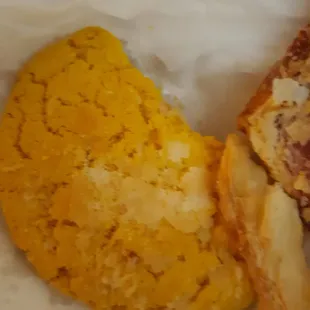 a slice of pizza and a side of rice