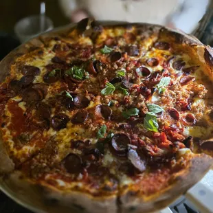 $23.46 Large margarita with pepperoni, sausage, sun dried tomatoes