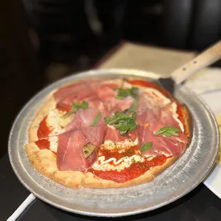 Quattro Formaggi pizza with added prosciutto