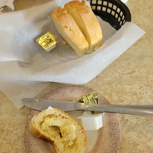 Awesome sour dough bread, fresh, served warm, real butter.