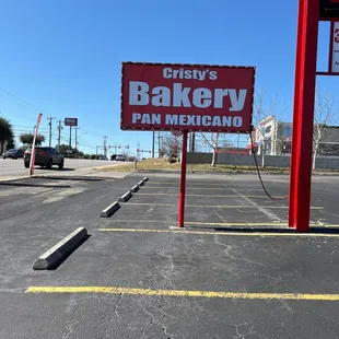 a sign in a parking lot