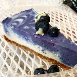 a slice of blueberry cheesecake