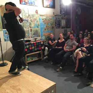 a man standing in front of a crowd