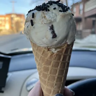 Caramel chocolate pretzel on a waffle cone.