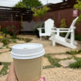 Enjoying an americano in the secret garden