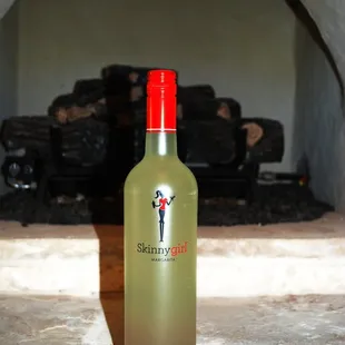 Skinny Girl Margaritas in front of the fireplace.