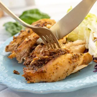 a plate of food with a fork