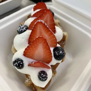 strawberries, blueberries, and cream