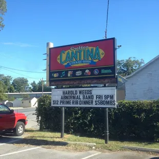 a red truck parked in a parking lot