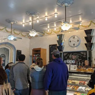 a group of people standing in line
