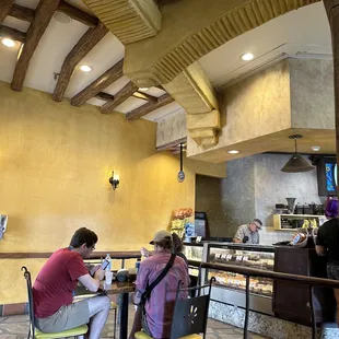 a couple of people sitting at a table