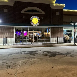 the front of the building at night