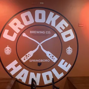 the logo for crooked handle