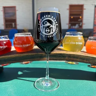 a glass of beer on a table