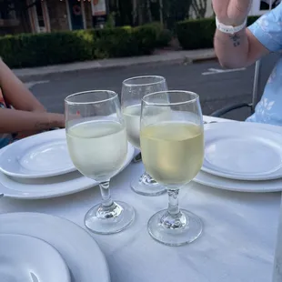 two glasses of wine on a table