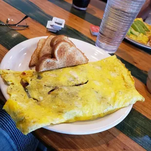 Ham, bacon, spinich and onion omelette. Awesome.