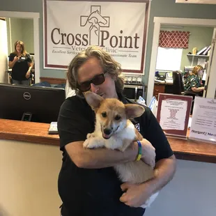 A client and his pup here for the pups check-up at the clinic.