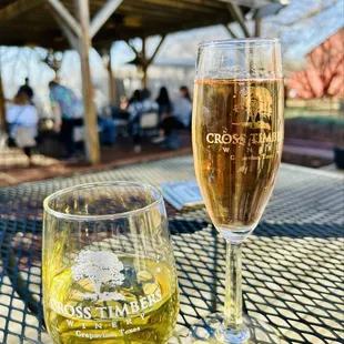 a glass of beer and a glass of wine