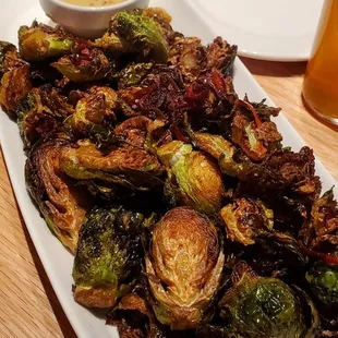 CRISPY BRUSSEL SPROUTS.  PERFECTLY SEASONED,  SOME OF THE BEST I EVER HAD.