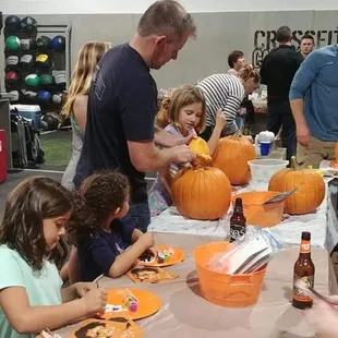 Getting artistic at our yearly pumkin carving night.