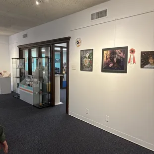 Art show exhibit with my daughter's art on display.