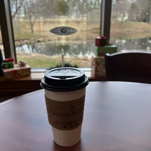 a cup of coffee on a table