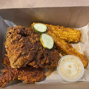 Hot chicken breast and wing with corn ribs.