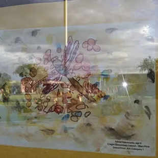 Charming art by the &quot;grand champion&quot;, on display by the library in the park.